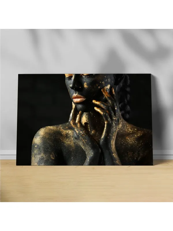 Tablou canvas Golden confidence – femeie africană în negru și auriu
