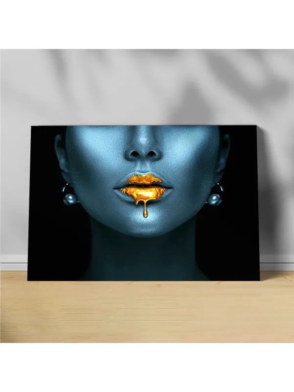 Tablou canvas Golden lips – femeie africană în negru și auriu